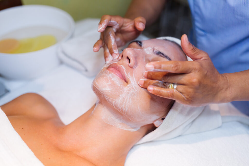 Woman getting a facial.